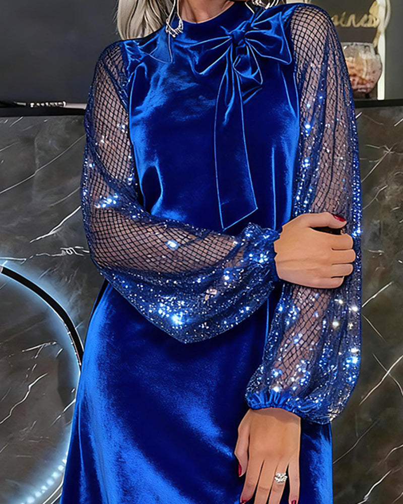 Elegante jurk met sprankelende mouwen en patchwork